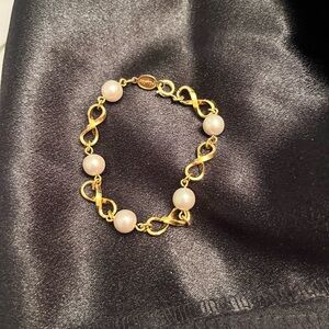 Vintage signed Elegant Napier Gold and Pearl Infinity Bracelet